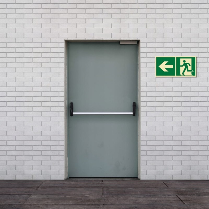 Znak PPOŻ Wyjście Ewakuacyjne w Lewo 15x30cm płyta PCV fotoluminescencyjna